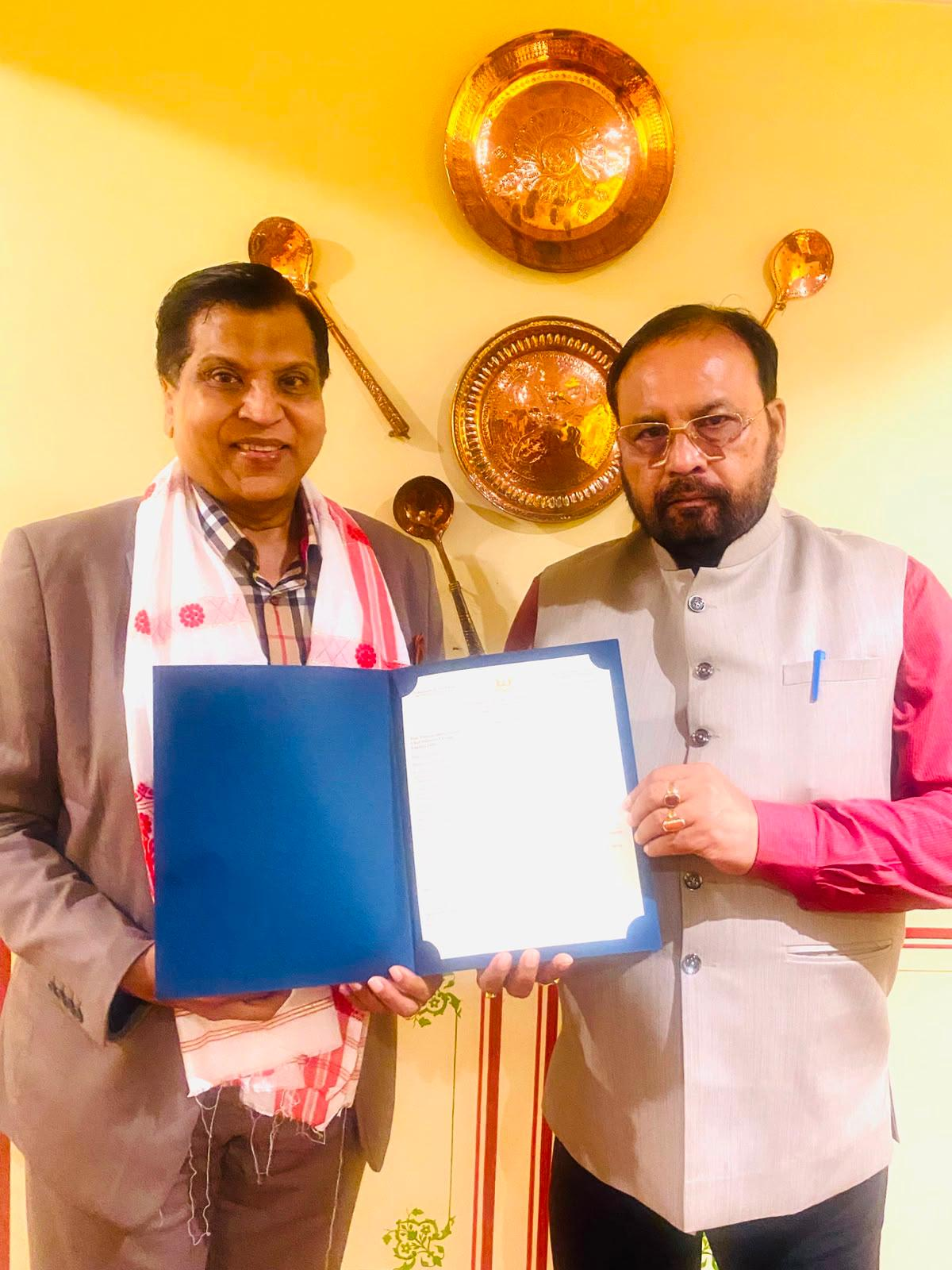Dr. VGP presenting AMEC Colors to Assam's Minister